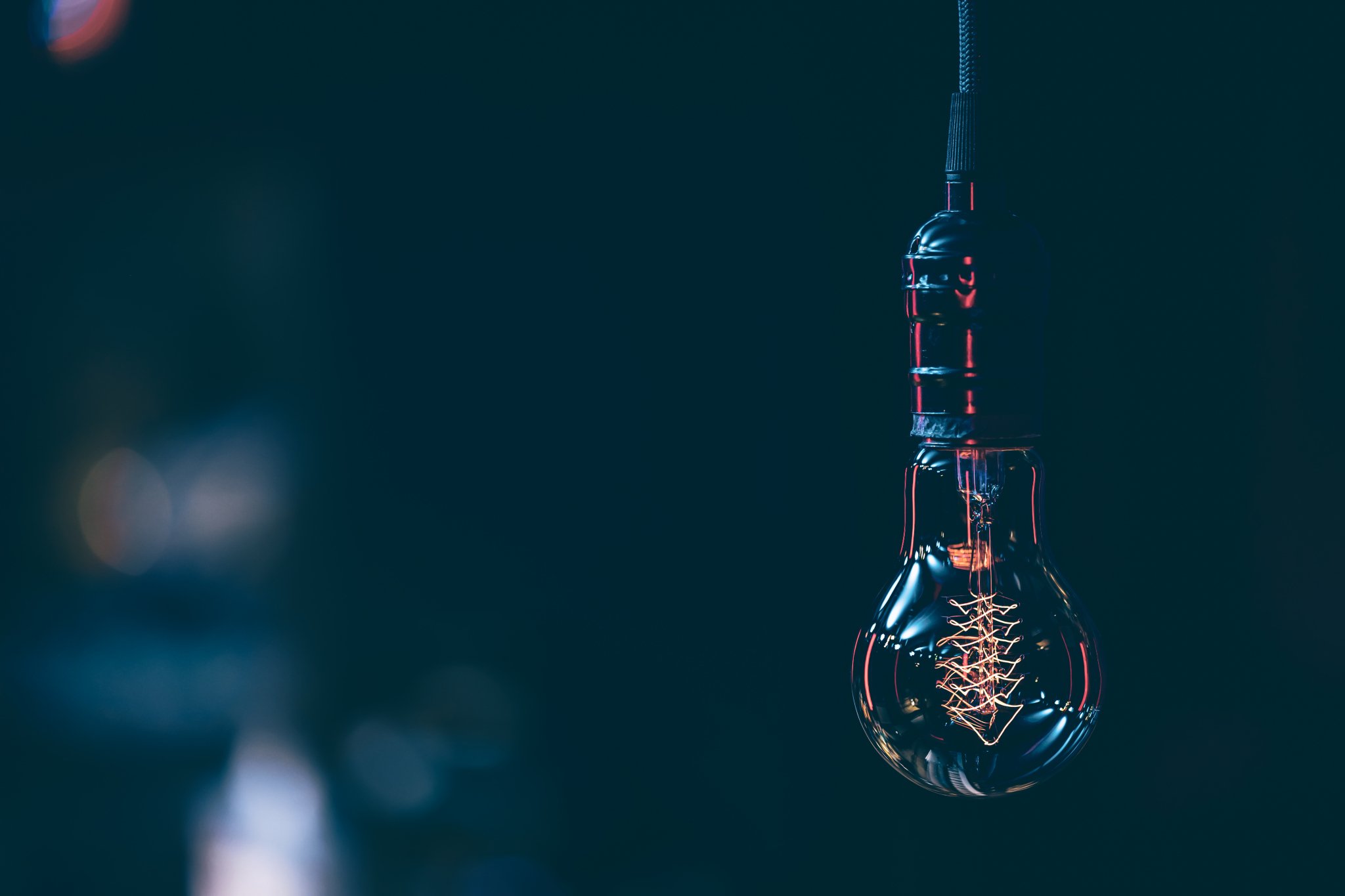 close-up-burning-lamp-dark-copy-space